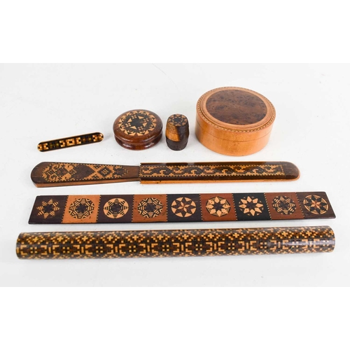 132 - A group of 19th century Tunbridge ware, to include a page turner, pill box, barrel form box, brooch,... 