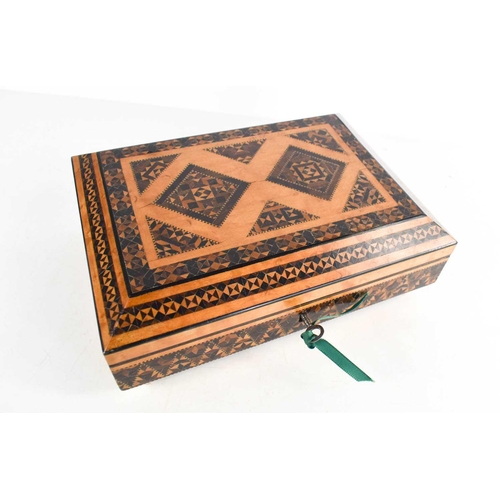 136 - A19th century Tunbridge ware sewing box, the canted lid opens to reveal a tray interior over a furth... 