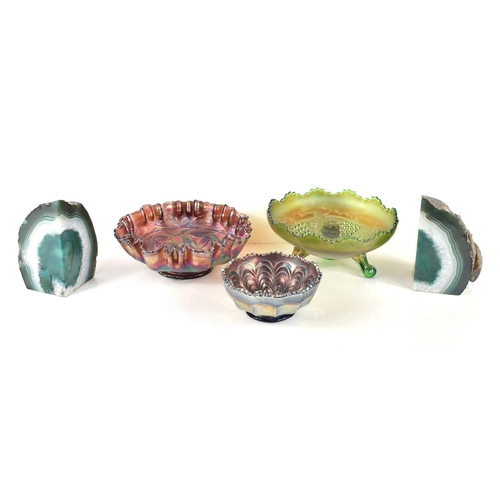 159 - A group of three Carnival glass bowls, decorated with fruits and foliage together with a pair of geo... 