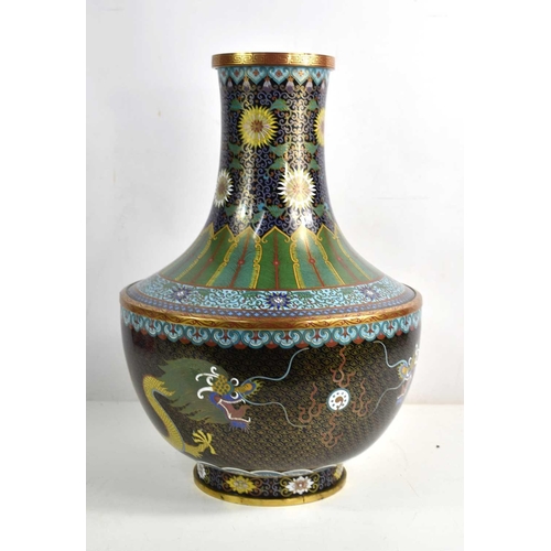 19 - A large Chinese cloisonne vase decorated with lotus blossom, foliage and two five clawed dragons cha... 