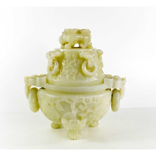 21 - A late 19th century Chinese jade censor, the cover modelled with a dog of fo, the body with dog of f... 