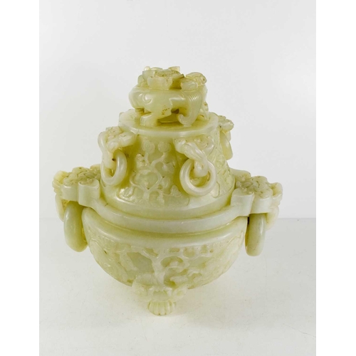 21 - A late 19th century Chinese jade censor, the cover modelled with a dog of fo, the body with dog of f... 