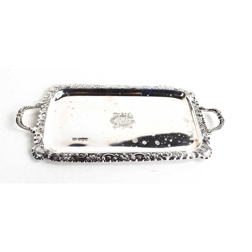 211 - A 19th century silver card tray, Sheffield 1890, with twin handles and embossed edge, 5.4toz.