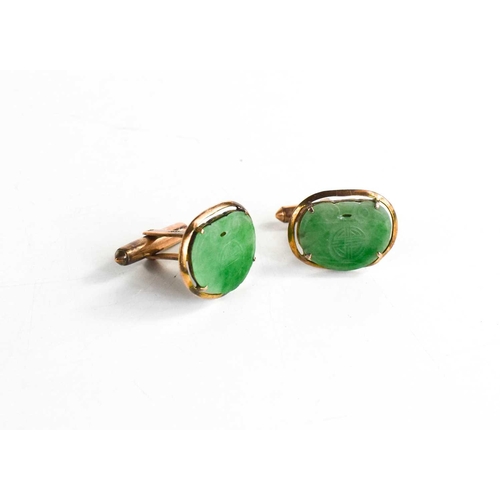 30 - A pair of Chinese 14ct gold and jade cufflinks, the jade plaques carved with Chinese symbols, 2.3cm ... 