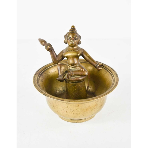 37 - A 19th century brass incense bowl, the inside of the bowl with seated Vasudeva, 12cm high.