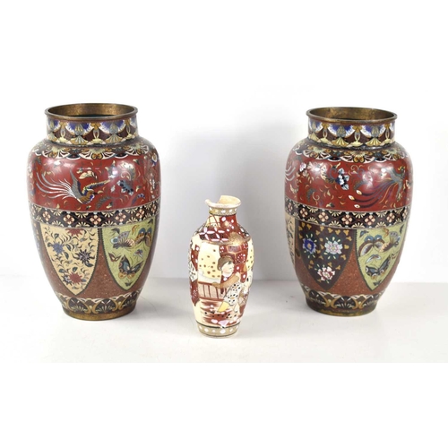 48 - A pair of Japanese Meiji period cloisonne vases, decorated with flowers, butterflies and birds, 25cm... 