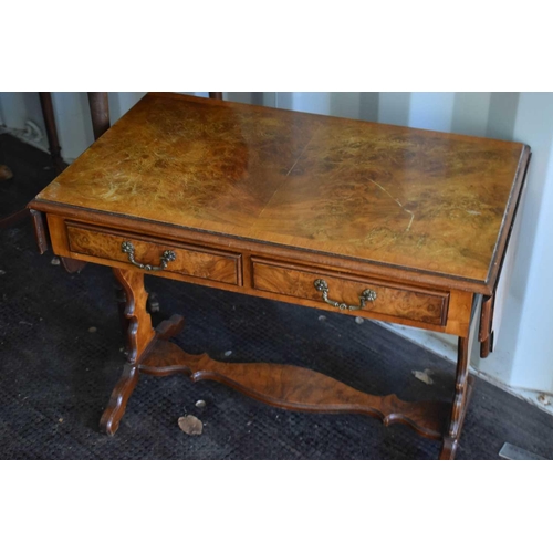 521 - A selection of walnut and mahogany furniture, to include a reproduction walnut sofa table, two oval ... 