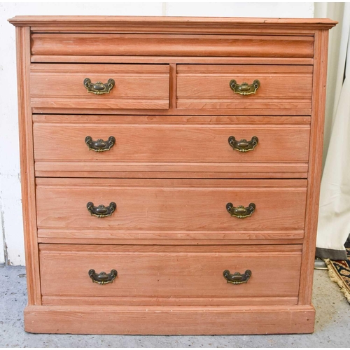 522 - An Edwardian pine chest of drawers, with two over three long graduated drawers, 117 by 110 by 50cm.