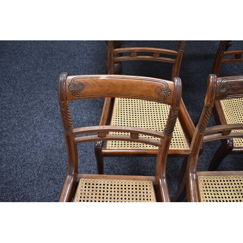 541 - A set of nine 19th century dining chairs with woven cane seats, turned back supports and sabre legs.