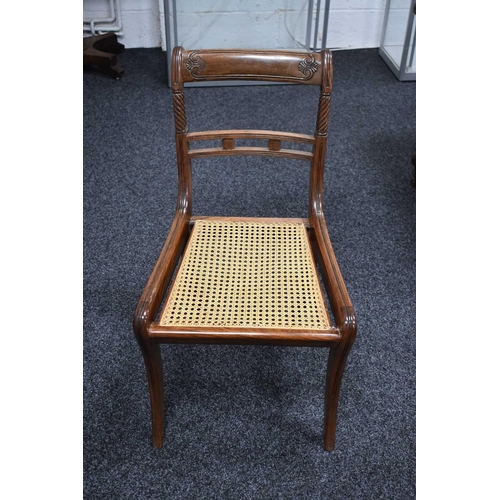 541 - A set of nine 19th century dining chairs with woven cane seats, turned back supports and sabre legs.