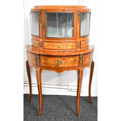 547 - A 19th century Louis XIV style French kingwood demi-lune vitrine, the single bow front door opens to... 