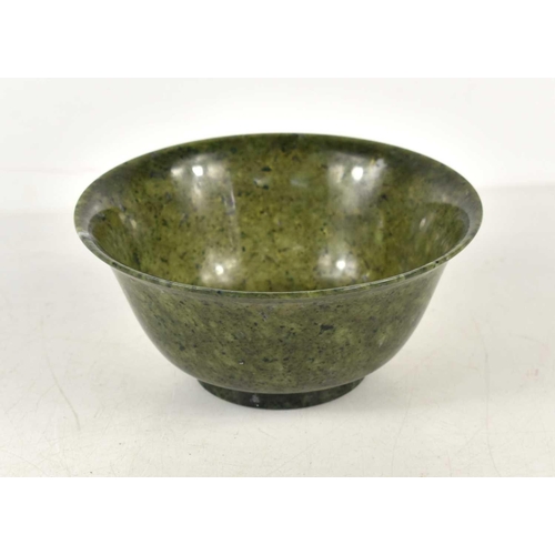 56 - A 20th century Chinese spinach jade bowl, 12cm diameter,