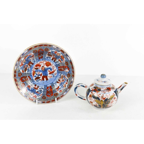 63 - A Chinese 19th century tea pot for one, in the Imari style pattern of blue red and gold, together wi... 