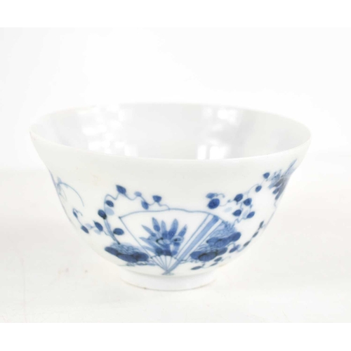 64 - A 19th century Chinese blue and white tea cup, 5.5cm high, six character mark to the base.