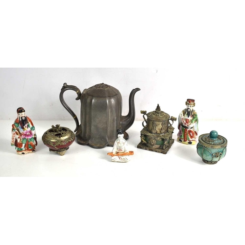 73 - A group of oriental items to include a Chinese incense burner, a Tibetan lidded pot decorated with m... 