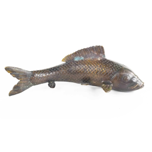 8 - A Qing Dynasty Chinese bronze coy carp, cast with detailed scales and features, 30cm long.