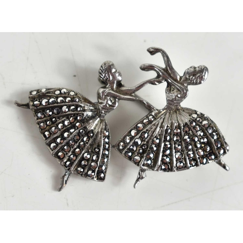 107 - A vintage silver and marcasite brooch of dancing ballerinas designed by Frederick Massingham.