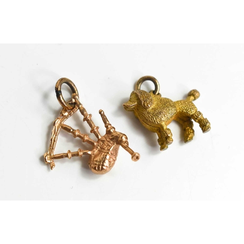 108 - Two 9ct gold charms, one in the form of a poodle, the other a pair of bagpipes, 6g.