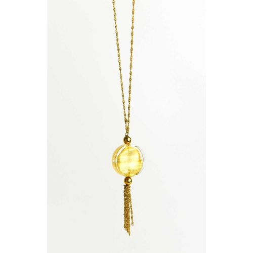 112 - A 9ct gold and Murano glass pendant necklace, the circular glass pendant containing gold leaf, with ... 