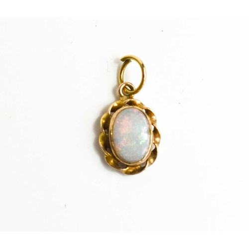 115 - A 9ct gold and opal pendant, 0.59g.