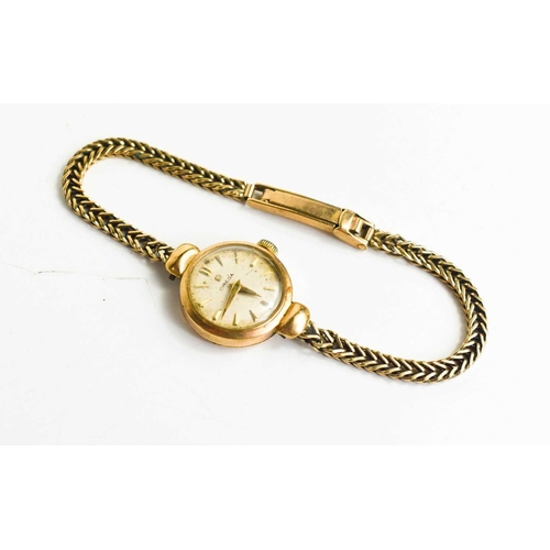 116 - A 9ct gold ladies Omega cocktail wristwatch, the 9ct strap of ropetwist form, folding clasp, 12.99g.