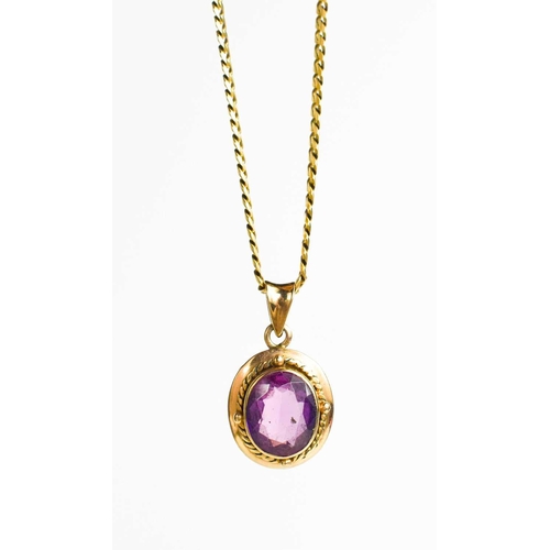 12 - A 9ct gold flat chain link necklace with a 14ct gold and amethyst set pendant, 12.8g.