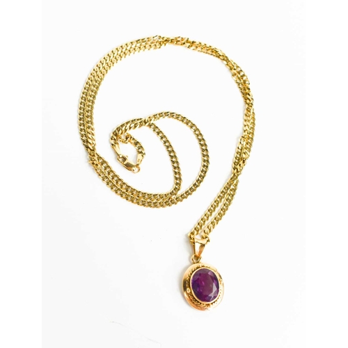 12 - A 9ct gold flat chain link necklace with a 14ct gold and amethyst set pendant, 12.8g.