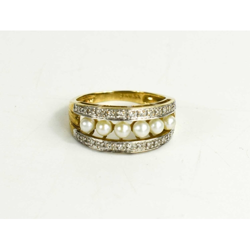 127 - A 9ct gold and pearl ring, six pearls set in a row between bands of diamonds, size N, 2.9g.