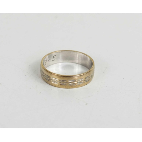 13 - A 9ct white gold wedding band, embossed with a decorative repeating border, size M, 2.21g.