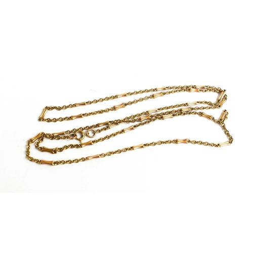 131 - A 9ct rose gold chain link necklace, interspersed with shaped links, 14g.