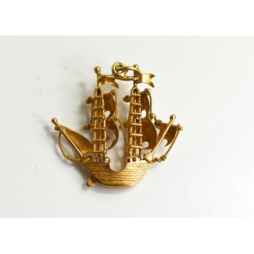 132 - An 18ct gold Portuguese pendant in the form of a ship, 4g.