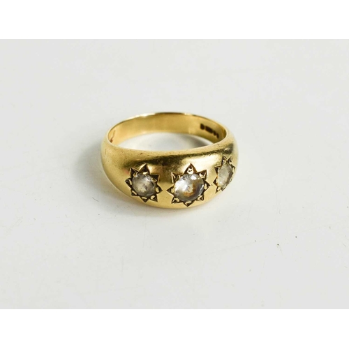 140 - A 14ct gold gentleman's ring, set with three paste stones, size S, 6g.