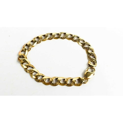 143 - A 14ct gold chain link bracelet, each link embossed on one side with decoration, crab claw clasp, 23... 