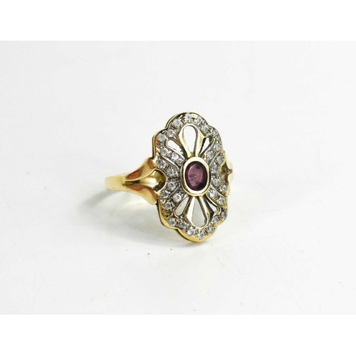 16 - A 9ct gold, garnet and white sapphire ring, the oval garnet in an open pierced setting with brillian... 