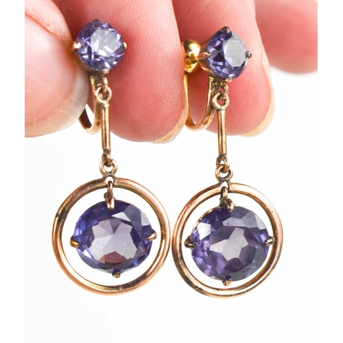 190 - A pair of 14ct gold and alexandrite drop earrings, with screw on backs, the brilliant cut alexandrit... 