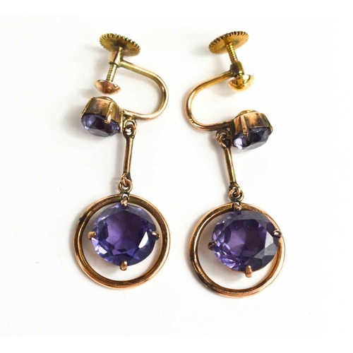 190 - A pair of 14ct gold and alexandrite drop earrings, with screw on backs, the brilliant cut alexandrit... 