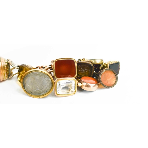 199 - A 9ct gold charm bracelet, with heart form lock clasp, a 9ct gold and agate swivel fob, a citrine an... 