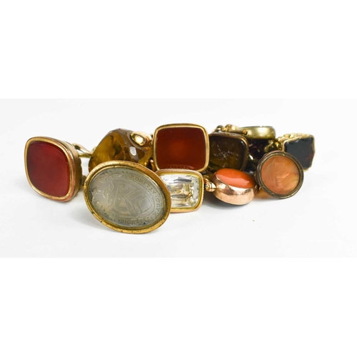 199 - A 9ct gold charm bracelet, with heart form lock clasp, a 9ct gold and agate swivel fob, a citrine an... 