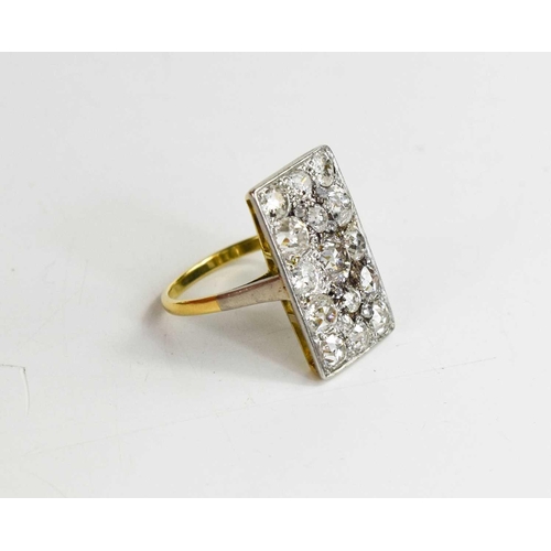 2 - An 18ct yellow gold and diamond ring, the rectangular platinum setting composed of fifteen old cut d... 