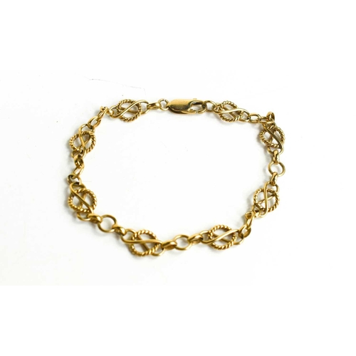 211 - A 9ct gold bracelet, composed on decorative hoop ropewtwist links, and crab claw clasp, 8.36g.