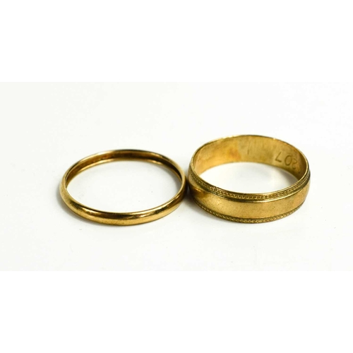 212 - A 9ct gold wedding band, size M, and a gold wedding band unmarked but testing as around 9ct, size O,... 