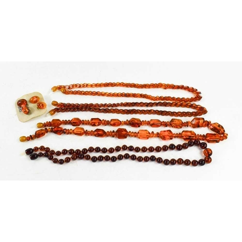 217 - A group of Baltic amber necklaces, comprising angular beads, 52cm long, and two strings of overlappe... 