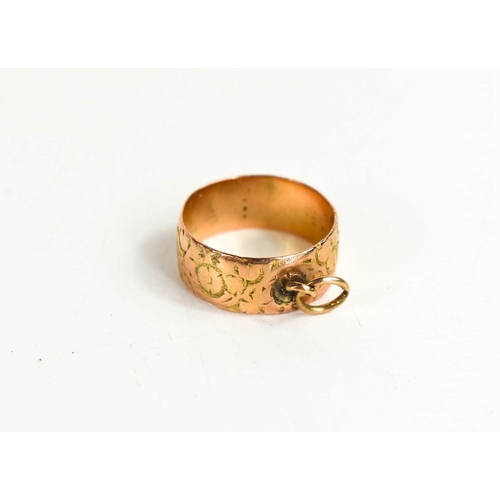 220 - A 9ct gold wedding band, engraved with decoration and having a hoop (lacking charm?), size M, 3.90g.