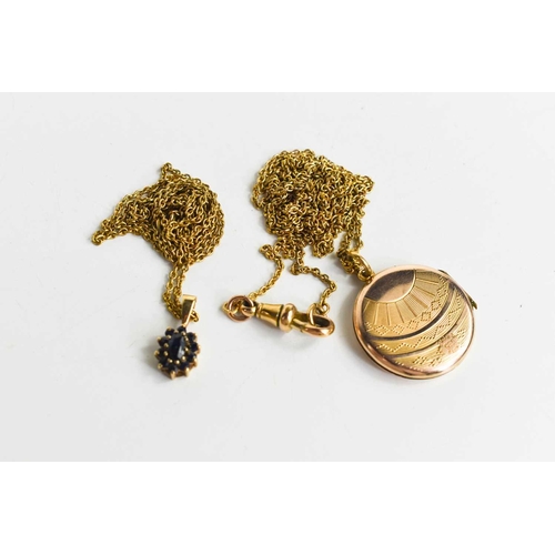 239 - A 9ct gold and sapphire flowerhead form pendant on a rolled gold chain necklace, together with a gol... 