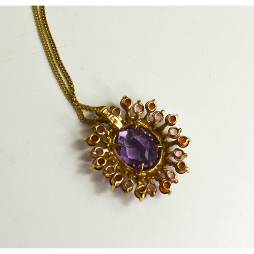 245 - A 9ct gold pendant necklace, the pendant set with oval cut amethyst to the centre, radiating pink sa... 