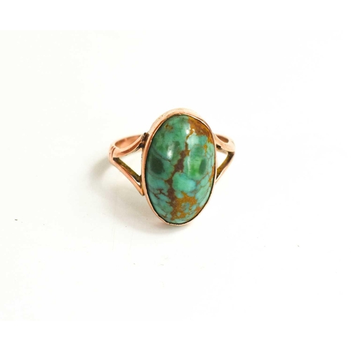 251 - A 9ct gold and turquoise ring, the oval cabochon turquoise flanked by V-cut shoulders, size M, 3.17g... 