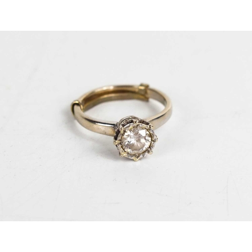 259 - An 18ct gold and diamond solitaire ring, in an enclosed setting, the diamond approximately ¾ct, 3.75... 