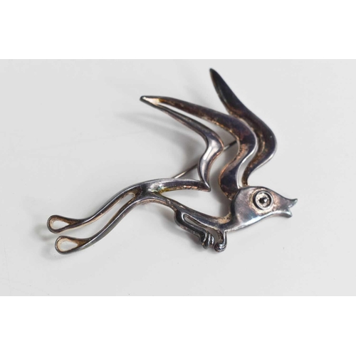 261 - A Greek silver brooch in the form of a bird, 5cm long.