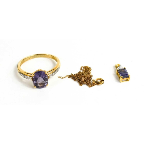 263 - A 9ct gold, amethyst and diamond ring, the oval cut amethyst set between diamond set shoulders, size... 