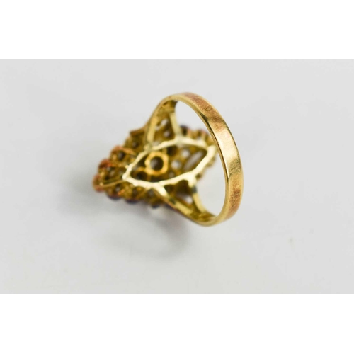 265 - A 14ct gold and diamond navette form ring, the variously sized brilliant cut diamonds in an openwork... 